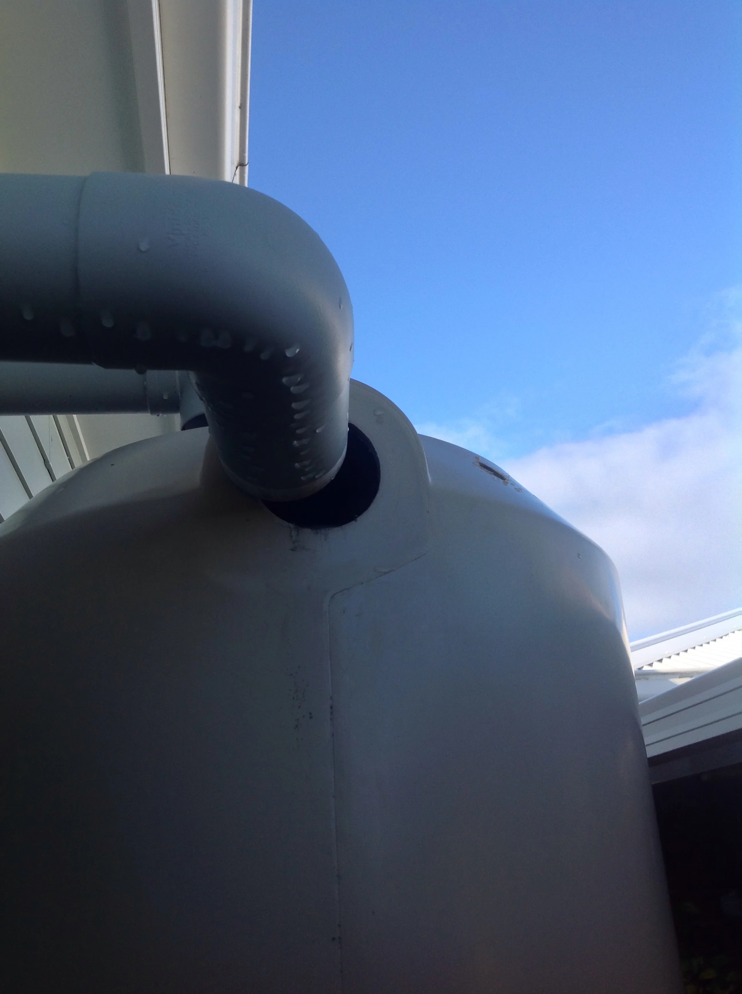 This rainwater tank overflow was connected originally. However, heavy rainfall and storms may have contributed to it being dislodged. This was discovered during a routine termite inspection.