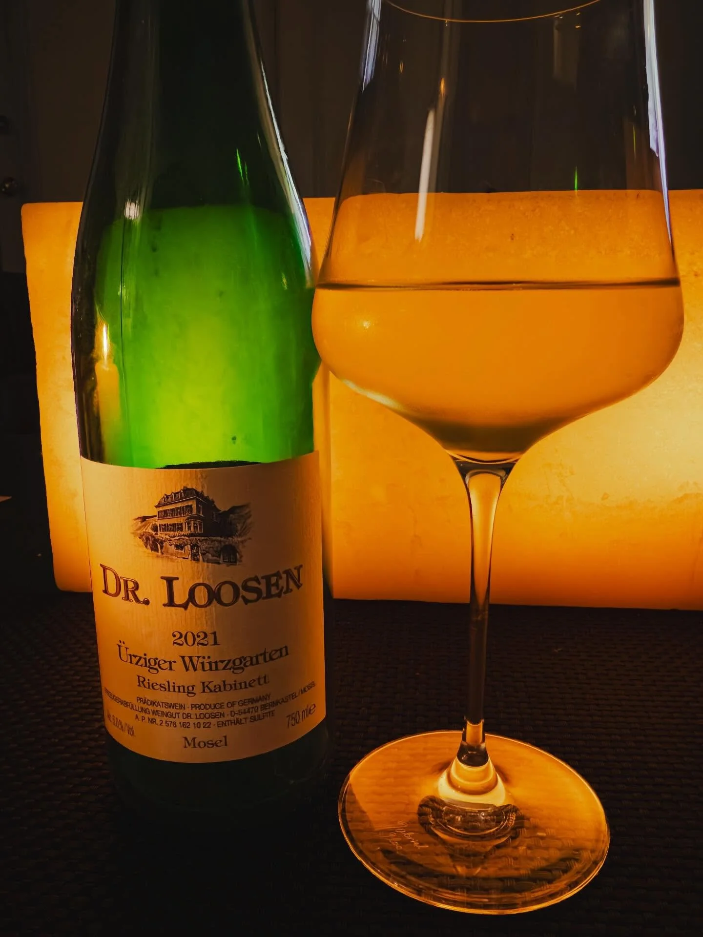 Riesling by candlelight on a cold winter night - a grape, a wine born in a cool climate warms the heart. @dr.loosen