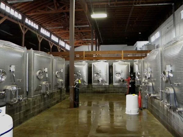 Heiland Hoff Architecture designed the Pallet Wine Company, which opened just in time for crush in 2009. The Pallet Wine Company is located in the historic 21,000 square foot Cooley-Neff building in downtown Medford.