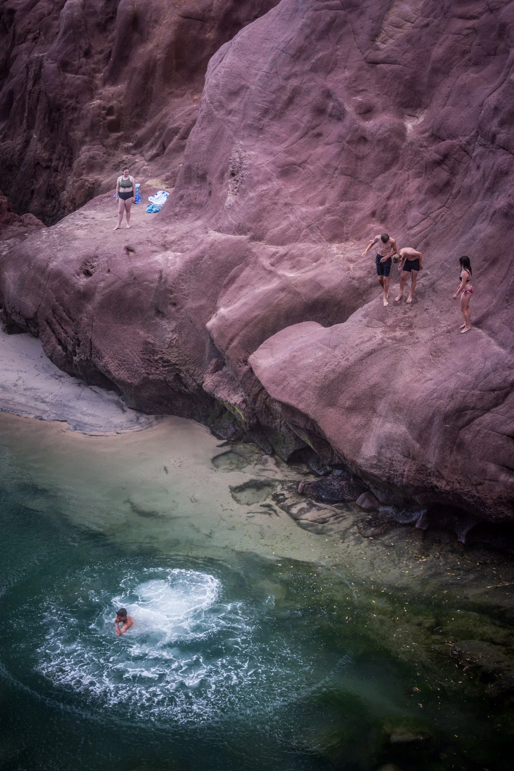 young man jumps off rocks-whangamata-the coromandel-new zealand-spid pye_B6C6445.jpg