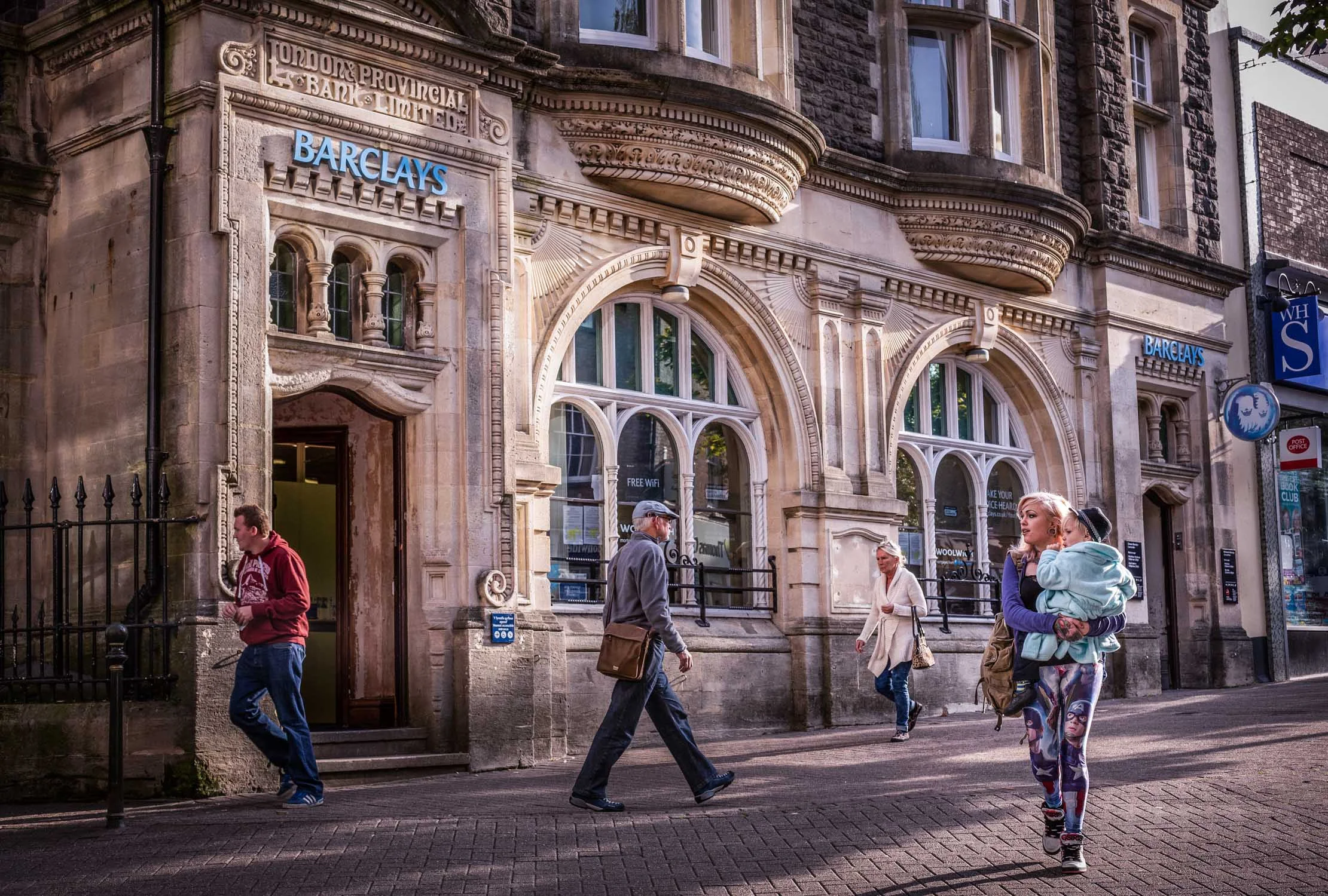 Young woman and baby walk through square-Carmarthen-Spid Pye-_B6C0521-Edit.jpg