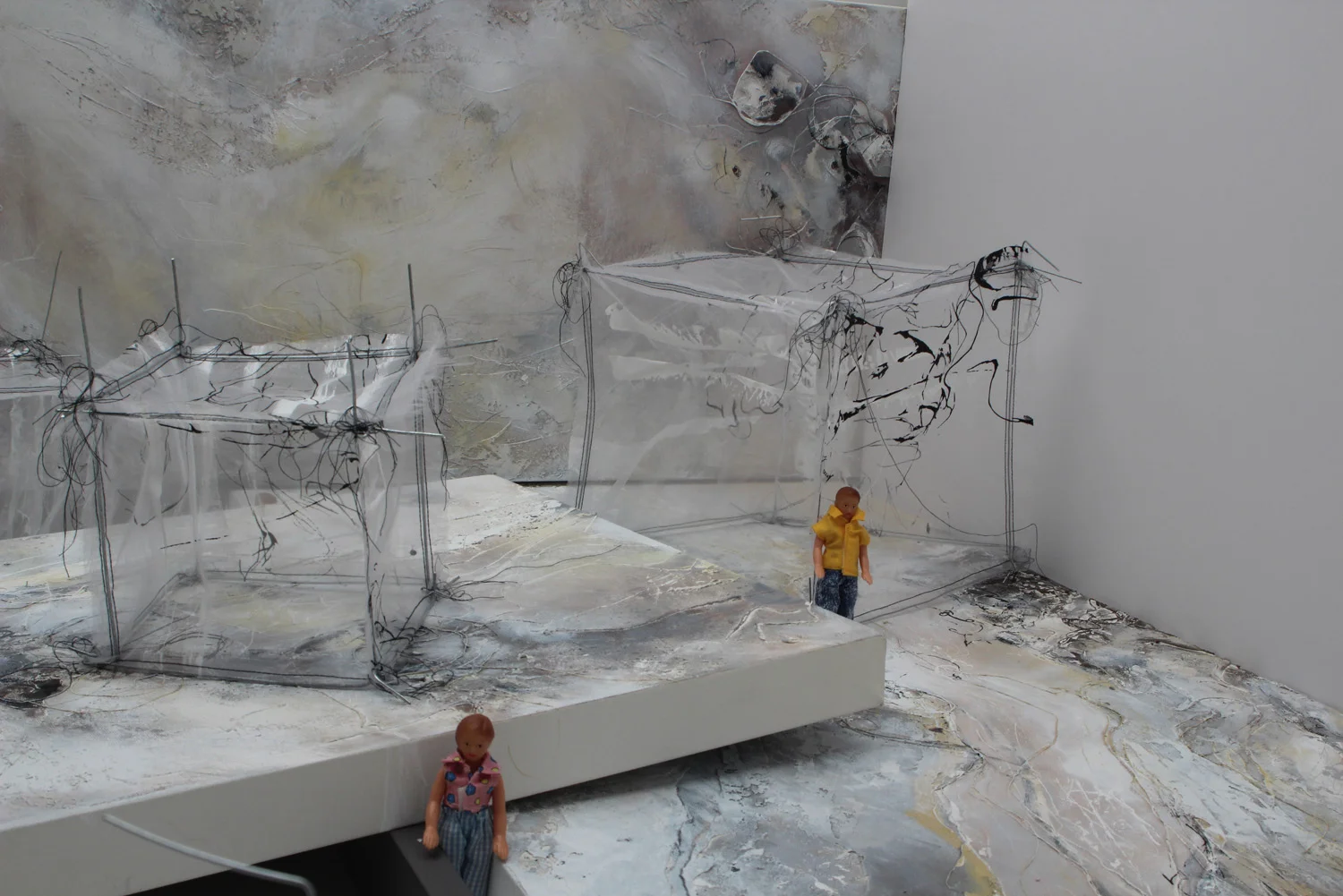 Miniature worlds of maps and people