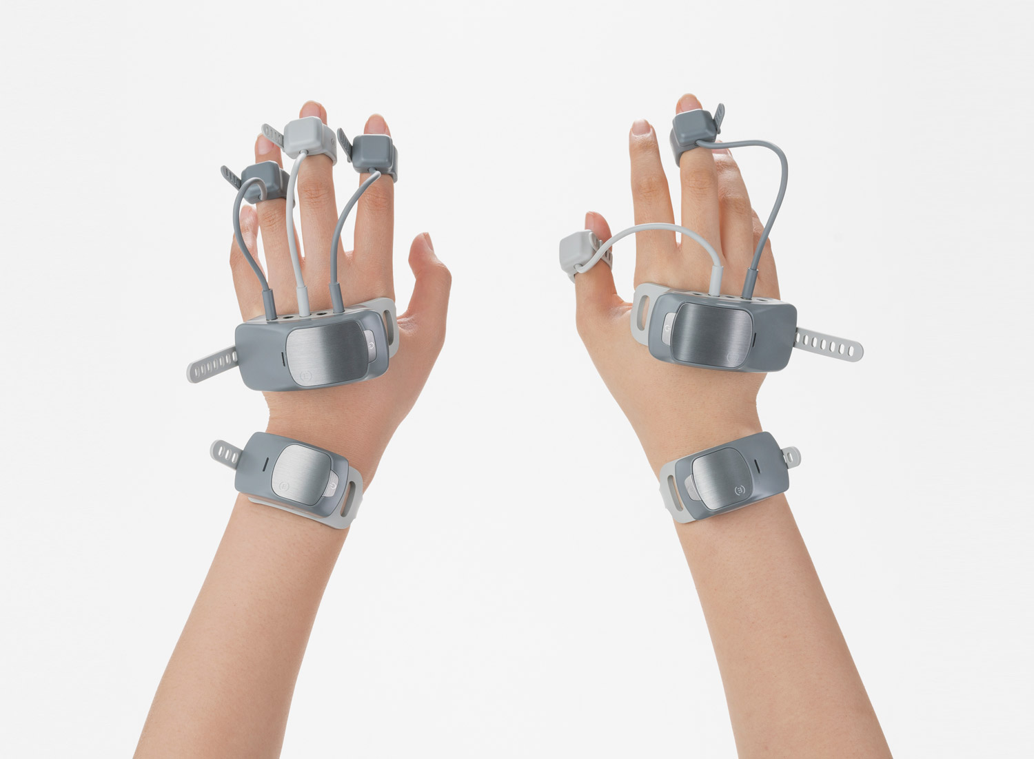 Manovivo is a wearable smart glove designed to monitor and train the impaired hand in daily life