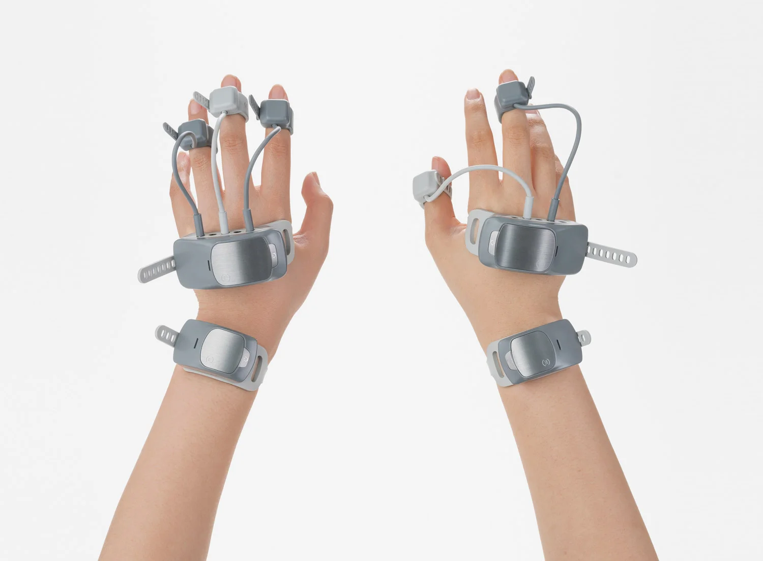 Manovivo is a wearable smart glove designed to monitor and train the impaired hand in daily life