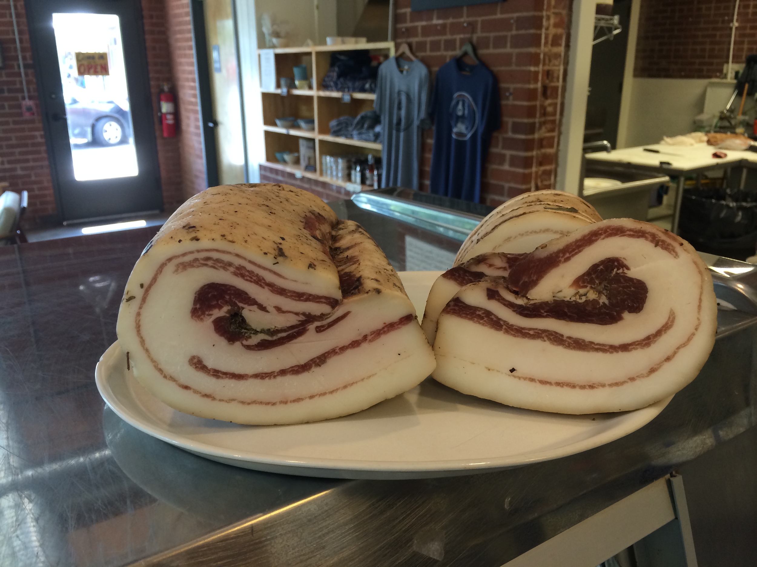 Pancetta - perfect for slicing thin (we will do this for you!) and wrapping around veggies, or sauteing with onions or garlic to form the base of a soup, pasta, or risotto. 