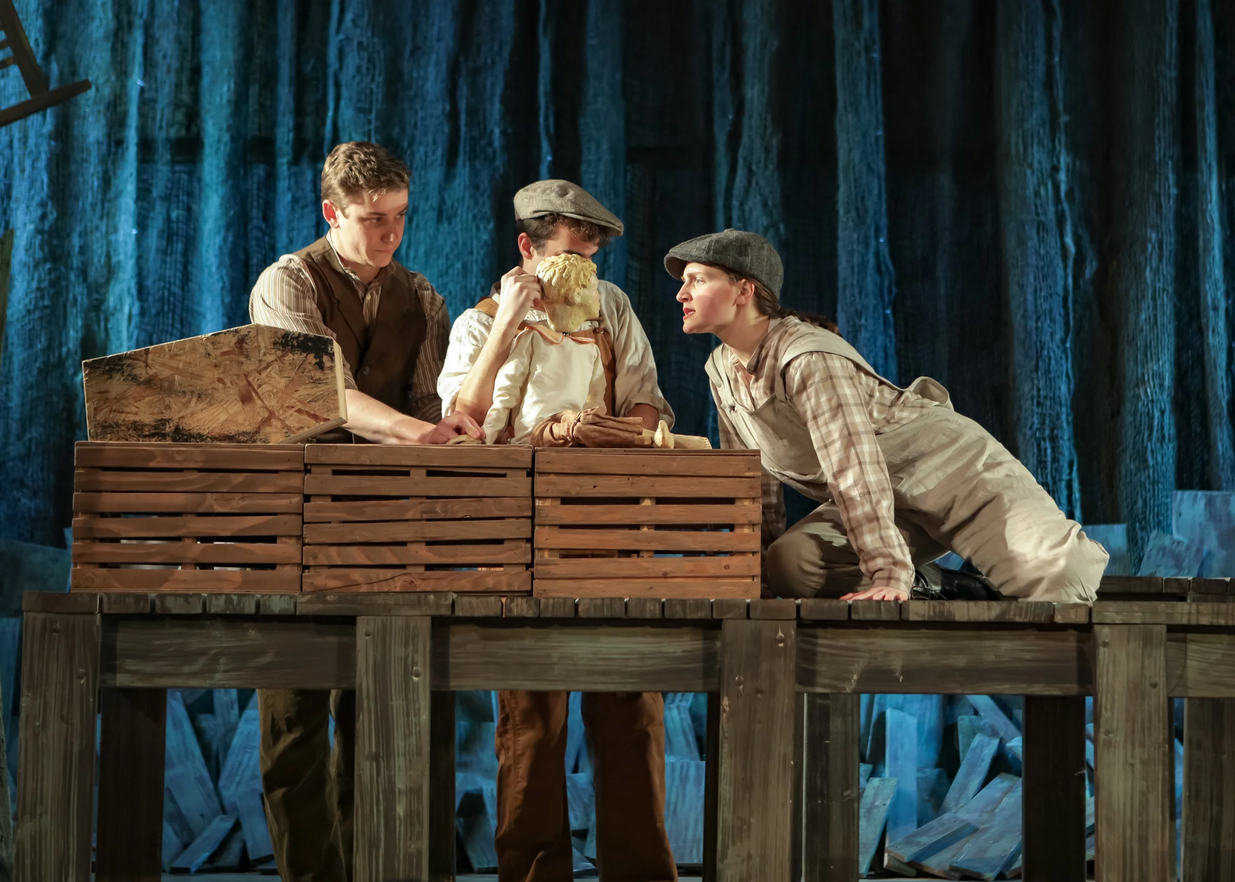 Ann Fogler as Brother, Scott Ballantine as Father, and Lucas Coura as Doodle in The Scarlet Ibis . Boston Opera Collaborative; January 2019. Photo Credit: Dan Busler
