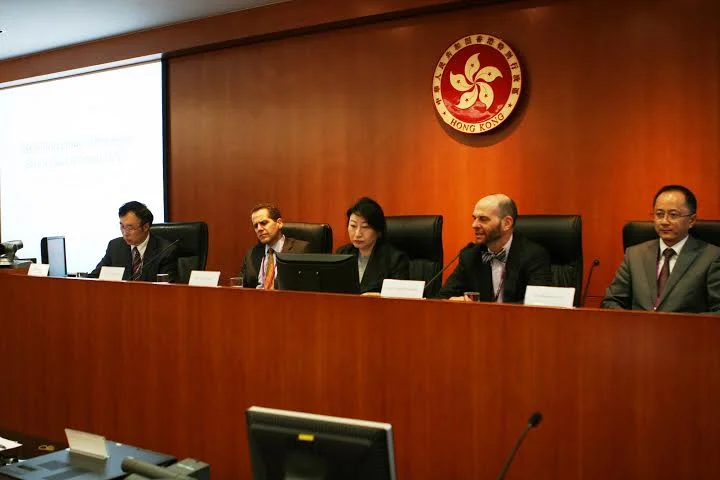 Adam Pritchard (Michigan Law School) presents his paper "Securities Law and its Enforcers" to the "General Issues of Legal Enforcement (2)" panel as Zhang Xianchu (University of Hong Kong Law Faculty), Michael Barr (Michigan Law School and former Asst. U.S. Treasury Secretary), Hong Kong International Arbitration Centre Chairperson Teresa Cheng and Vice Chairman and Secretary General of the Shenzhen Court of International Arbitration Liu Xiaochun listen. 