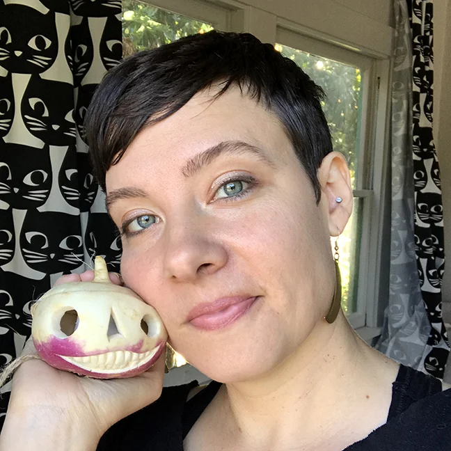 Illustrator with carved turnip-man