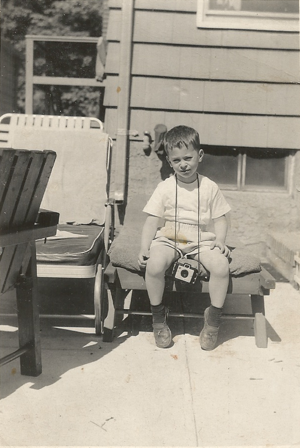Age 5, with Brownie.