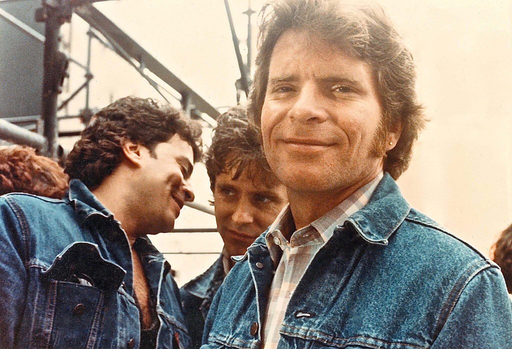 Martin backstage at first Farm Aid concert with guitarist Mike Wanchic and John Fogerty, 1985.