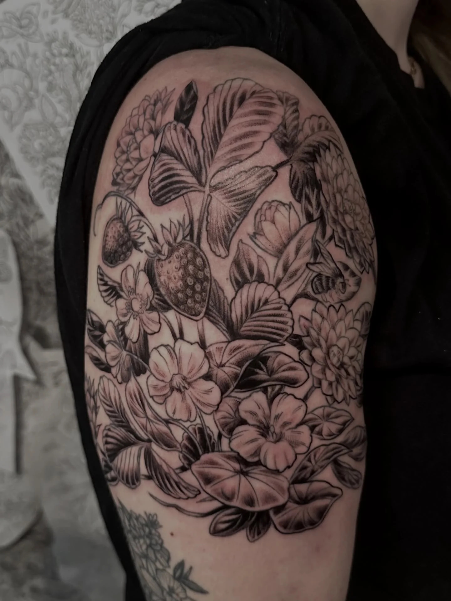 Appreciate you driving up to Minneapolis, Caitlin! Glad we got to finish up this shoulder tattoo to add to your patchwork sleeve! It&rsquo;s always a pleasure to work with you! :) 
.
#minneapolistattoo #twincitiestattooartist #midwesttattooer #midwes