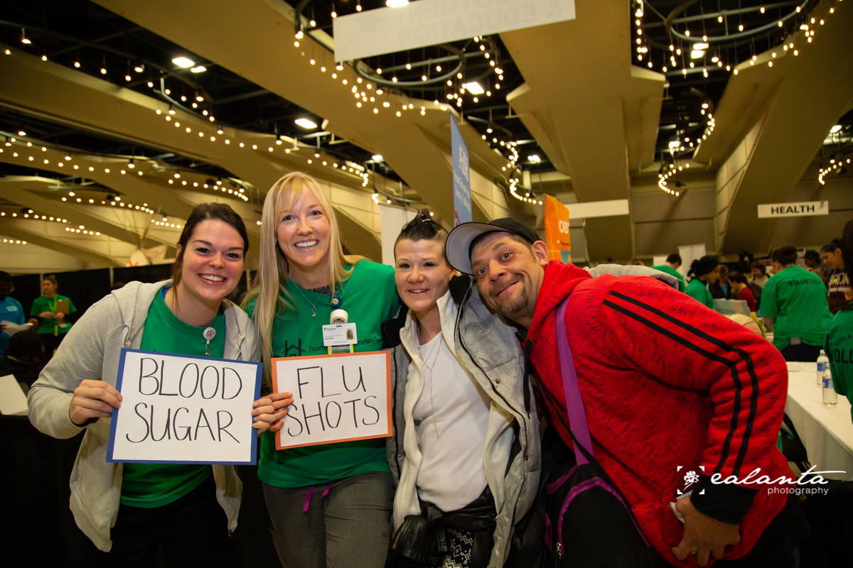 2 volunteers and clients.JPG