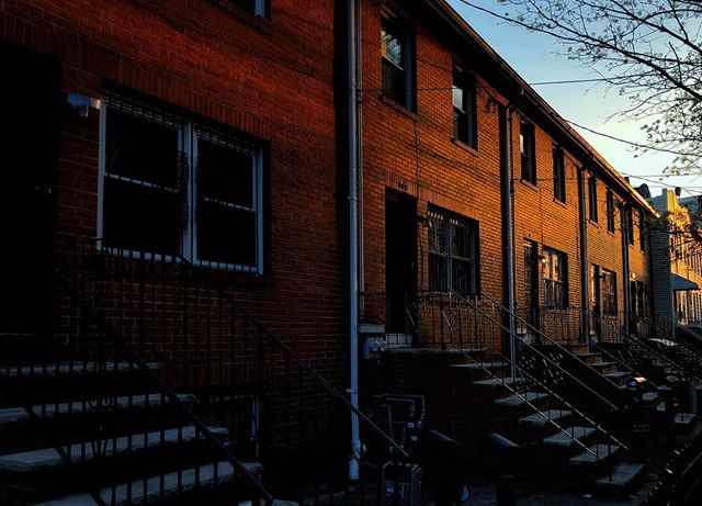 The sun setting on these brick home got me.