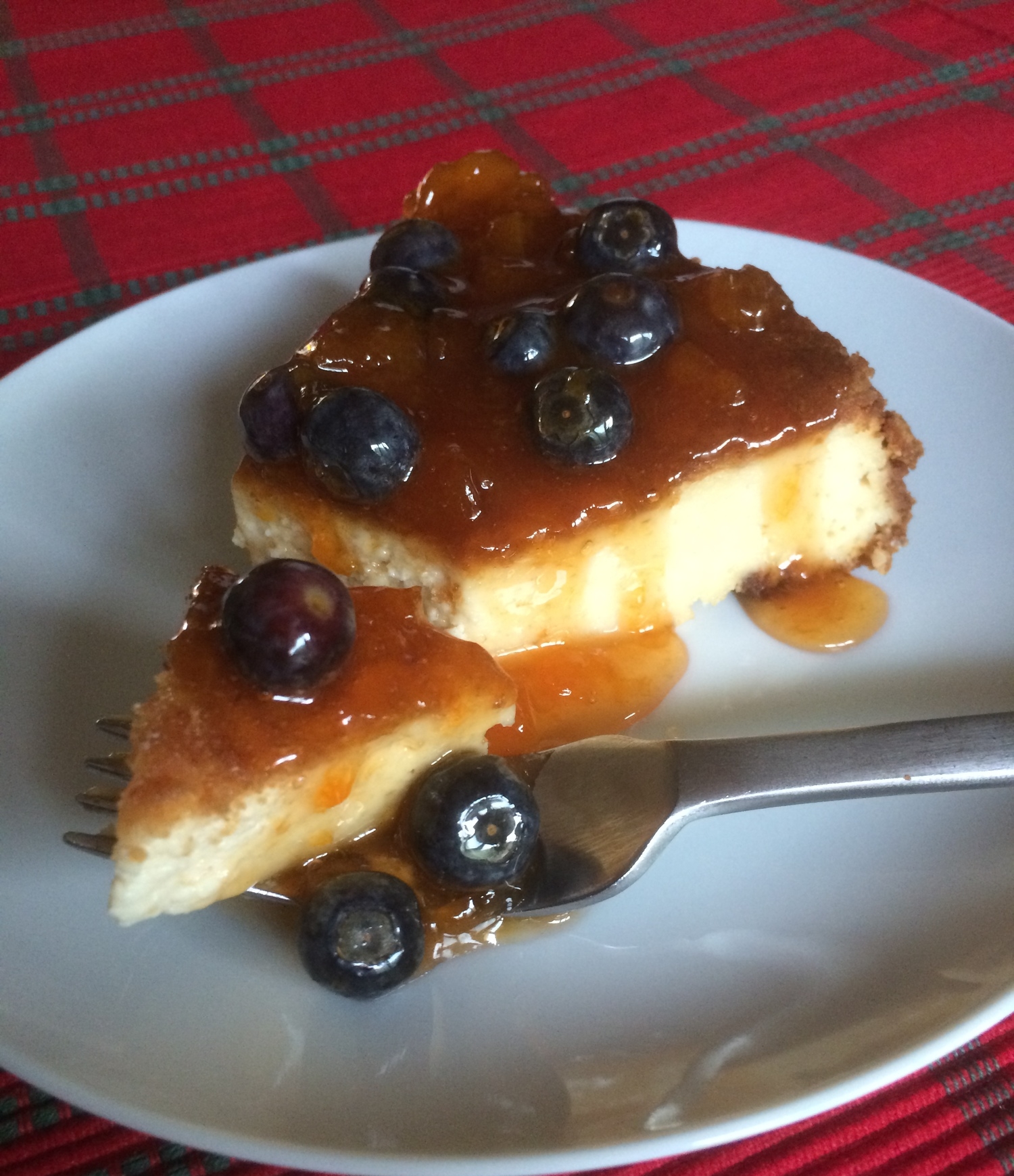 Cheesecake with Apricot-Blueberry Sauce