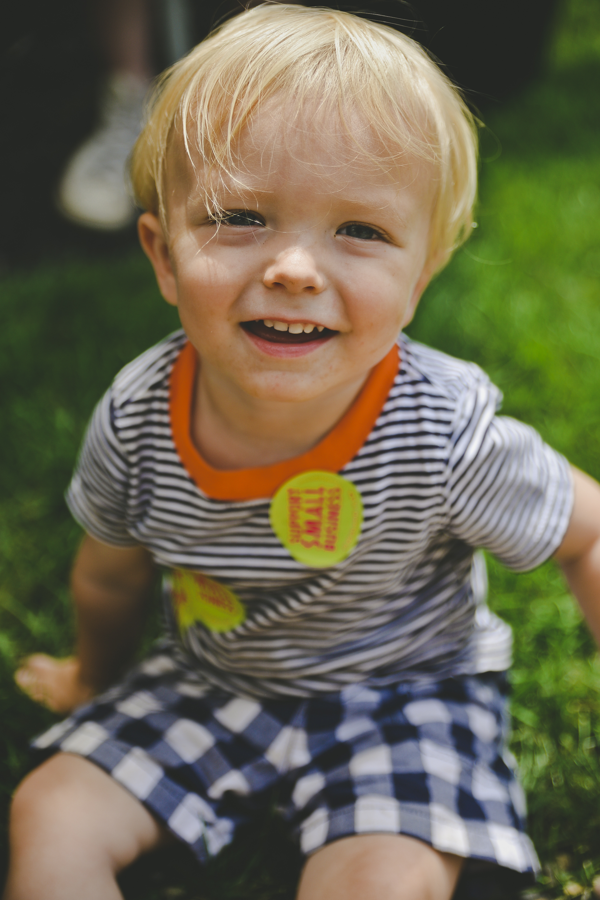Finn with our Support Small Businesses Stickers. SPEC: 3" x 3" Circle Full Color UV Coated Vinyl Sticker