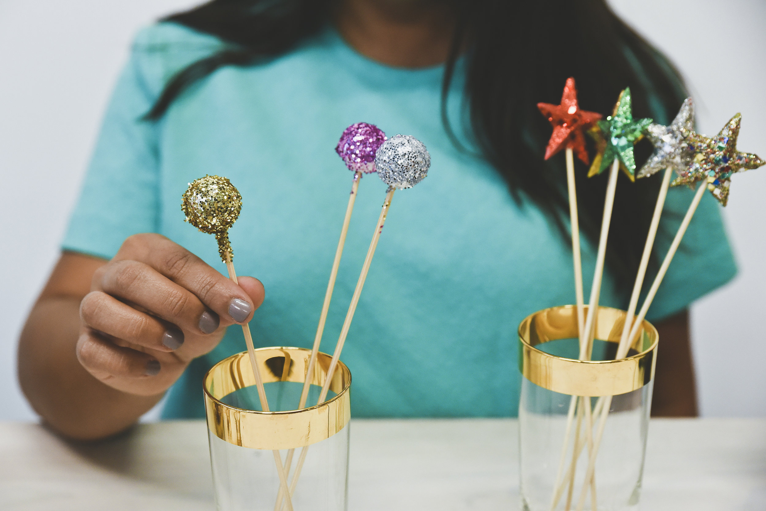 Star swizzle sticks from All Things For You and dress from Ode Vintage