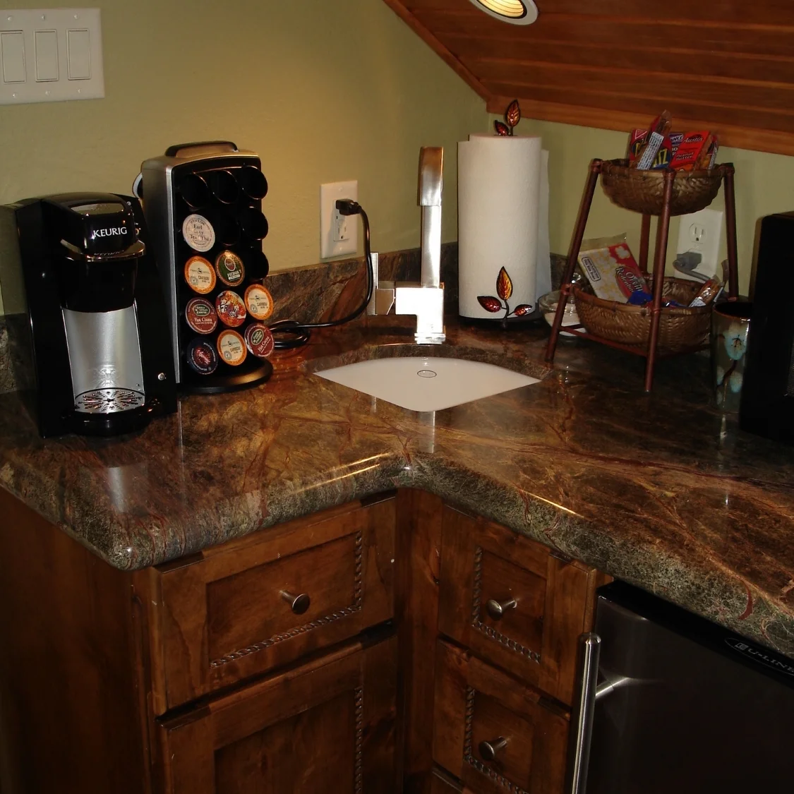 3 cm Rainforest marble with a laminate edge detail (additional fees apply)