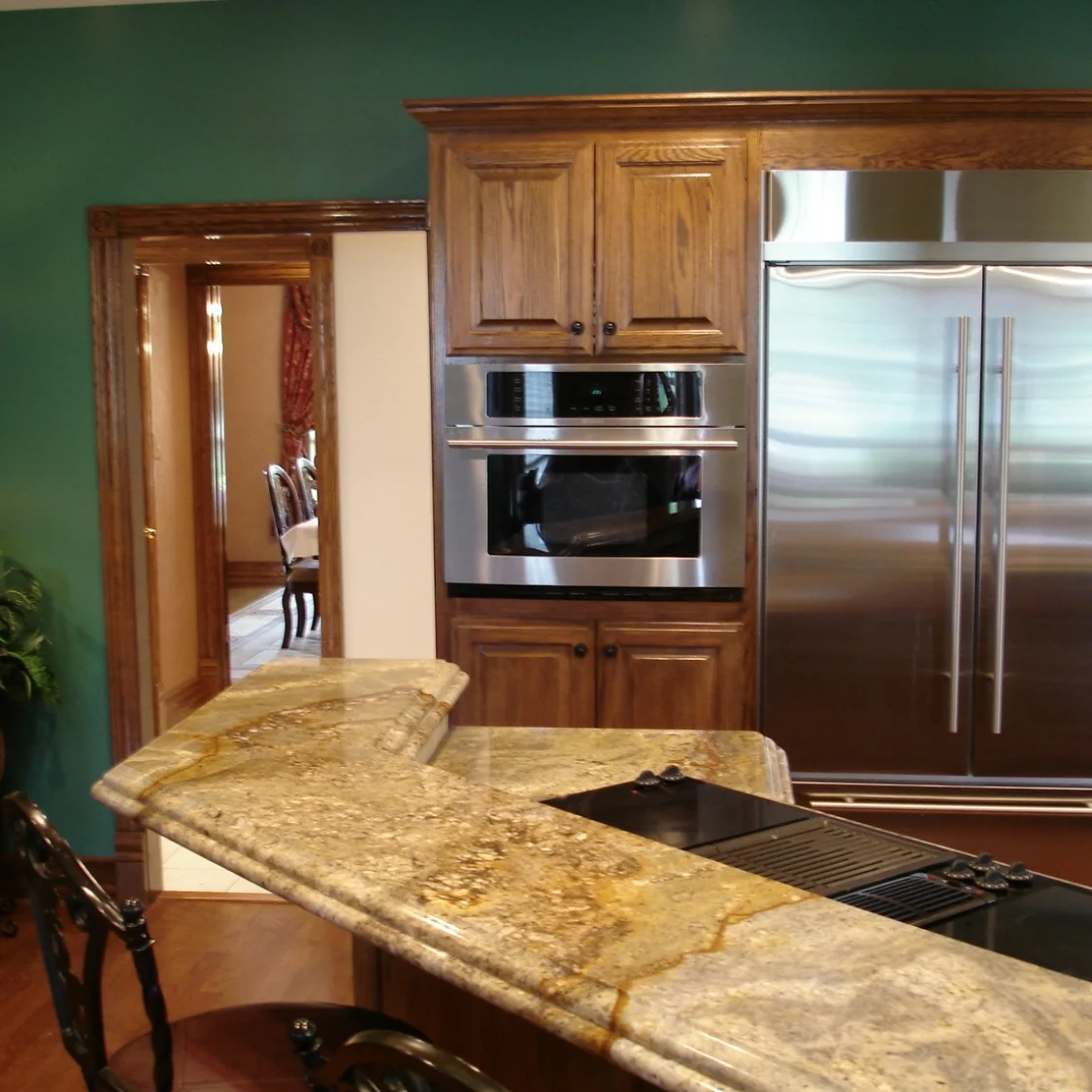 Magma Gold granite with a 6 cm laminate Roman ogee bullnose edge detail (additional fees apply)