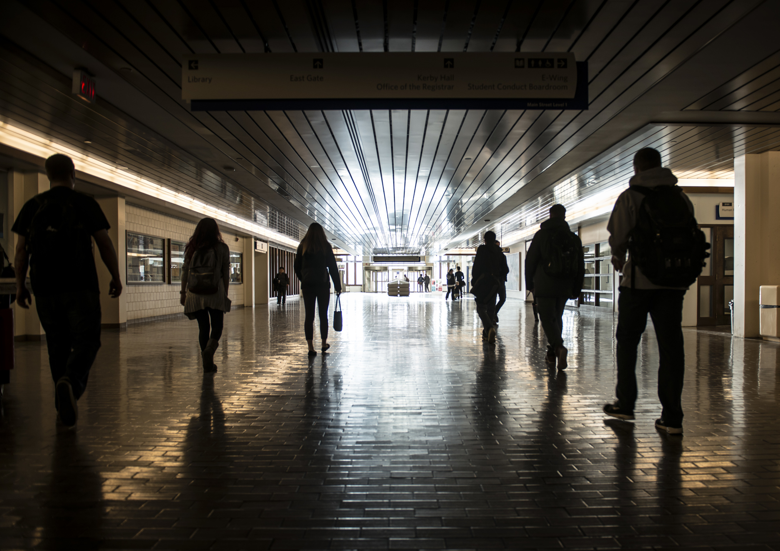 Students venture through the "main street" area at Mount Royal University. It has become far more difficult to gain entrance to the school, according to data provided by a city institution.