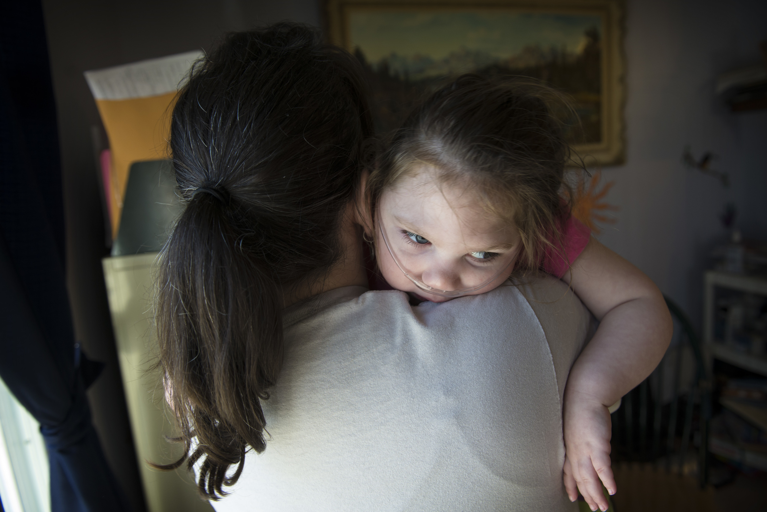 After Coleen Pomkoski was born, her parents could think only seconds ahead: “Will she live?” Coleen coded after her birth and it took doctors eight minutes to get her heart pumping. It was another 20 minutes before she took her first breath. She suffers from epilepsy and cerebral palsy as a result, binding her to a wheelchair with constant access to an oxygen tank. To help her move through her home with more ease, Accessible Housing Calgary is renovating the family's home in 2015.