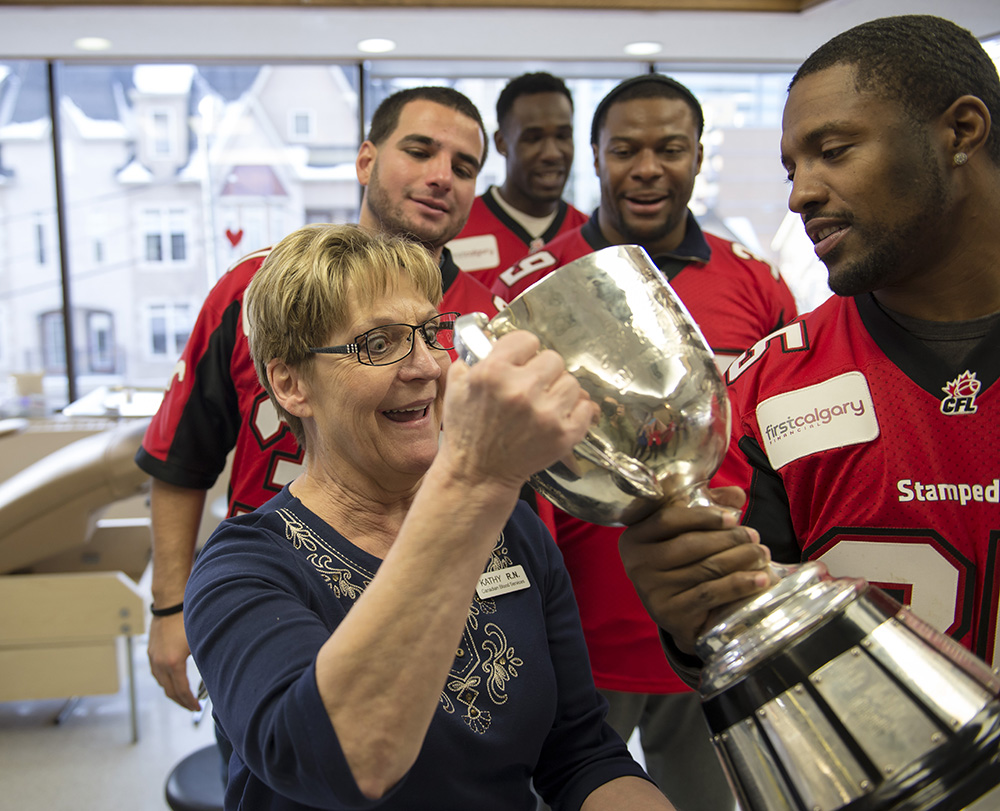 The Calgary Stampeders brought the Grey Cup to the Canadian Blood Services in February, 2015, giving the nurses and blood donors a chance to sling back some Coca-Cola from the cup itself.