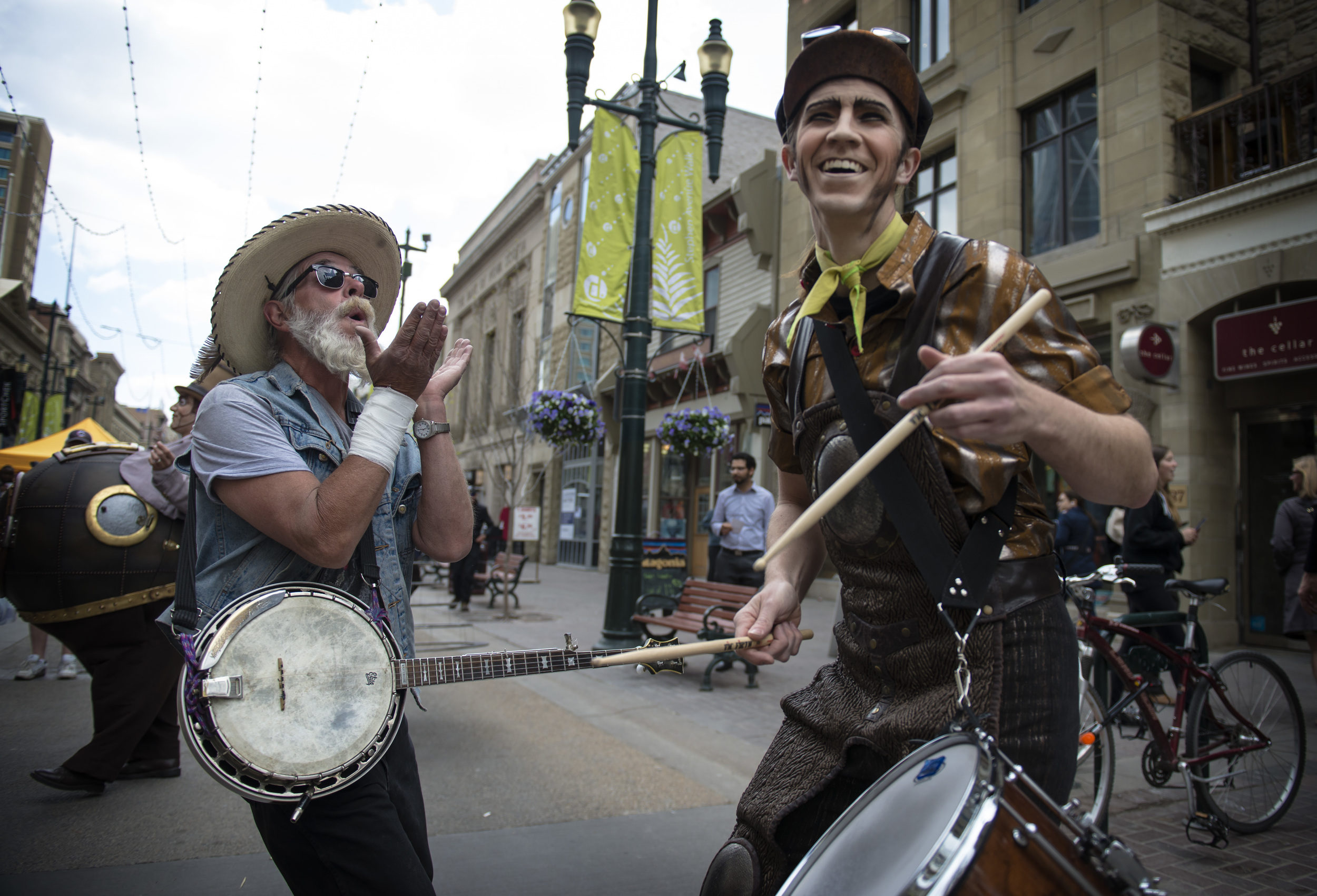 The cast of Cirque de Soleil’s latest show Kurios paraded down Stephen Avenue to promote its last two weeks in Calgary. Local musician Andy Mitchell offered his praise to the troupe, joining in with the his banjo.