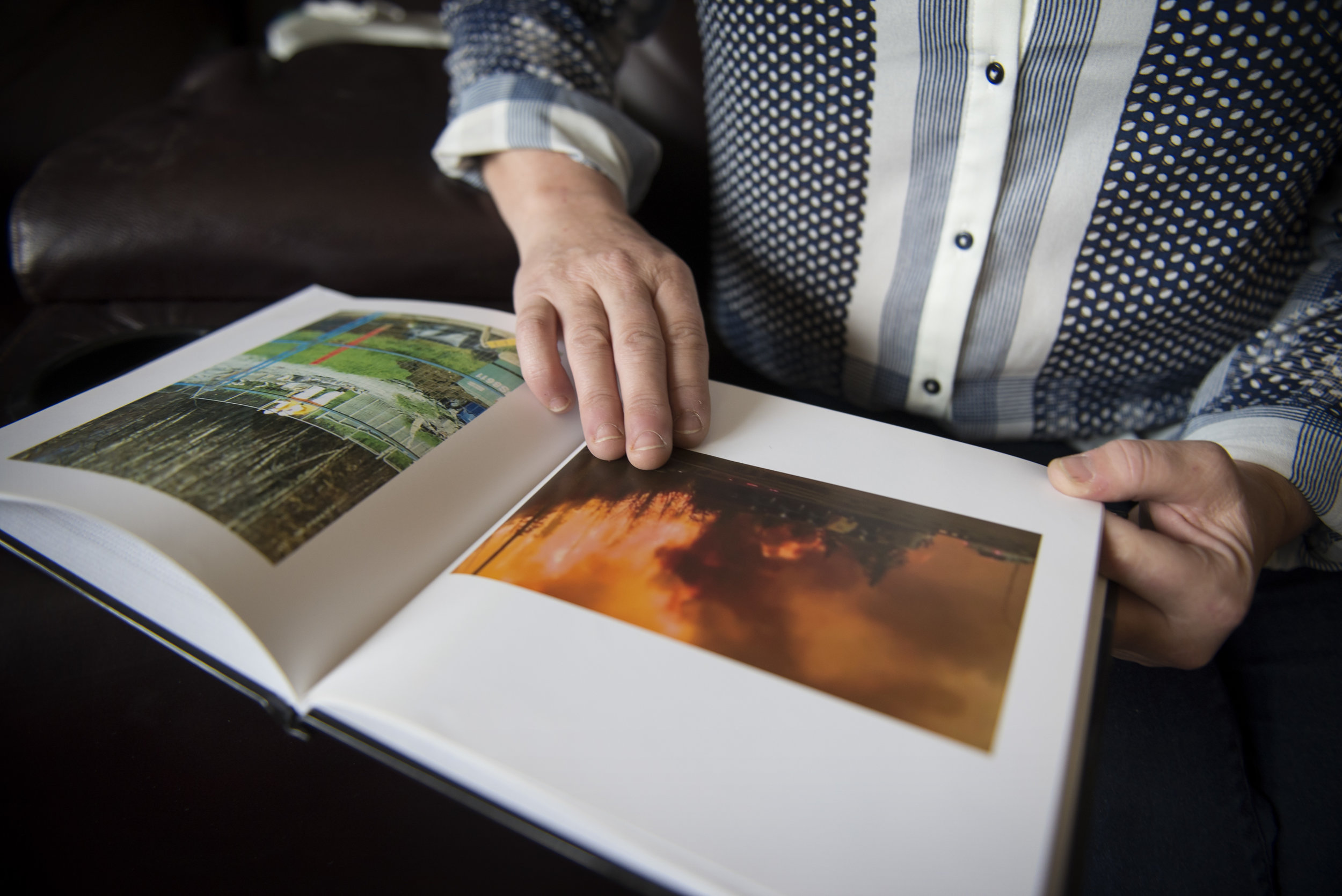 Sandra Legacy holds a scrapbook she made of her house that burned to the ground in the 2016 Fort McMurray wildfire. She and her husband had only lived there for only a year and a half.