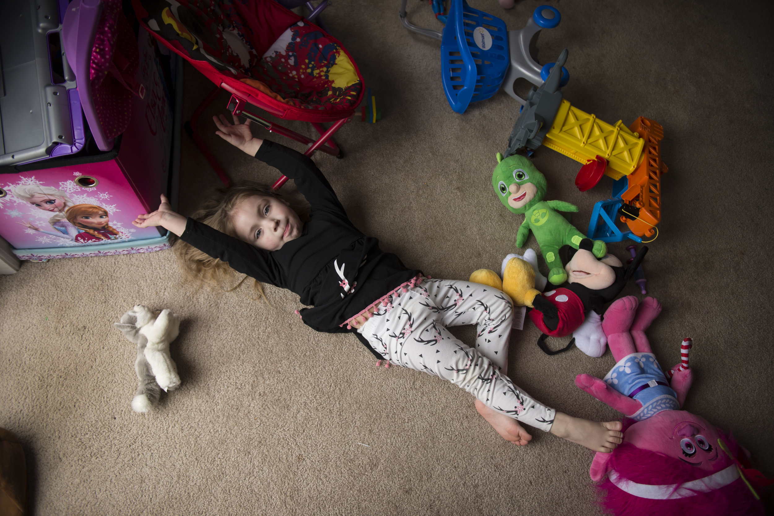 Ever since the family moved back to the city after the fire, Abby has been hit with a laundry list of illnesses that her mom ticks off on her fingers: pneumonia, tonsillitis, strep, ear infections.