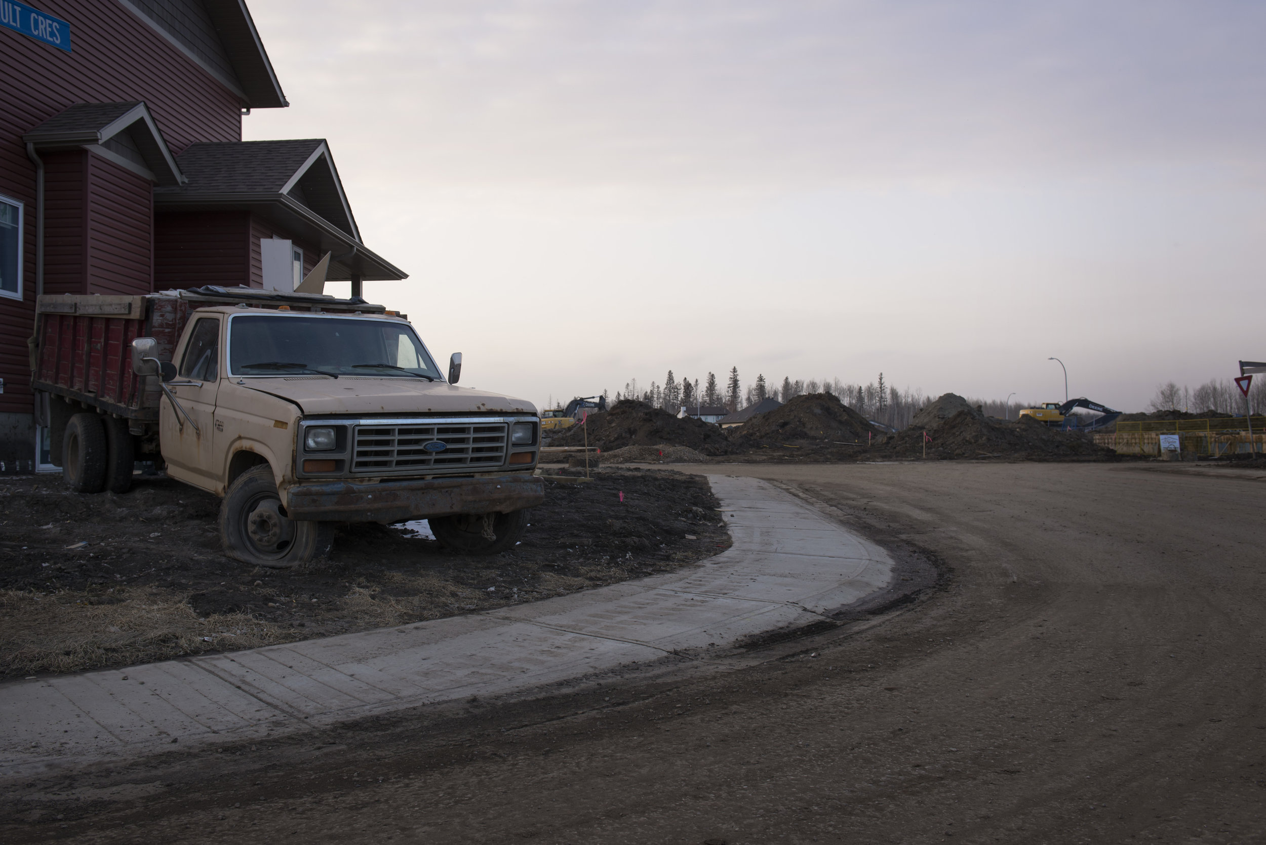 Some neighbourhoods were almost entirely destroyed by the flames, but newly rebuilt homes are rising up from the ashes.