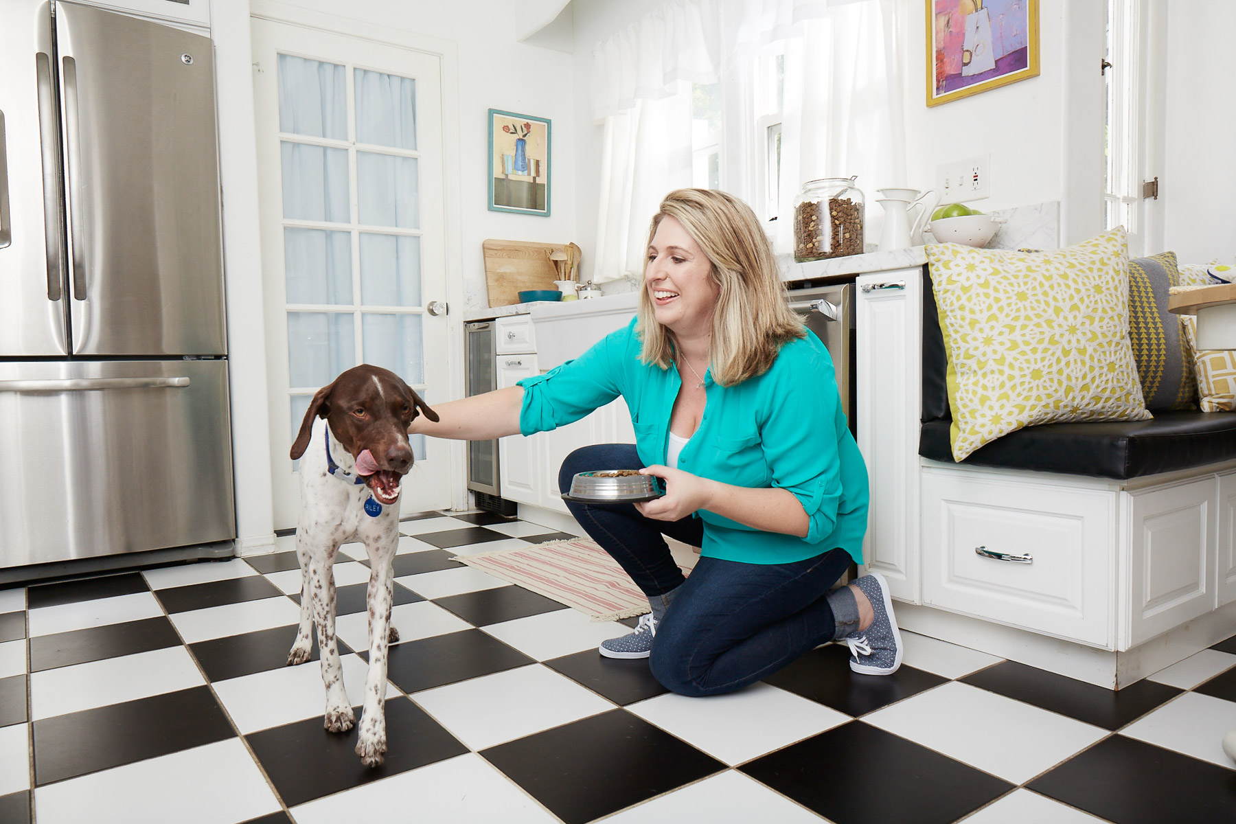 woman-feeding-dog-natural-balance-pet-dog-food-photographer.jpg