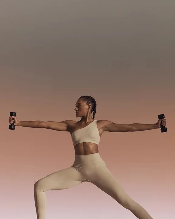 woman-with-hand-weights-warrior-sculpt-class-1.jpg