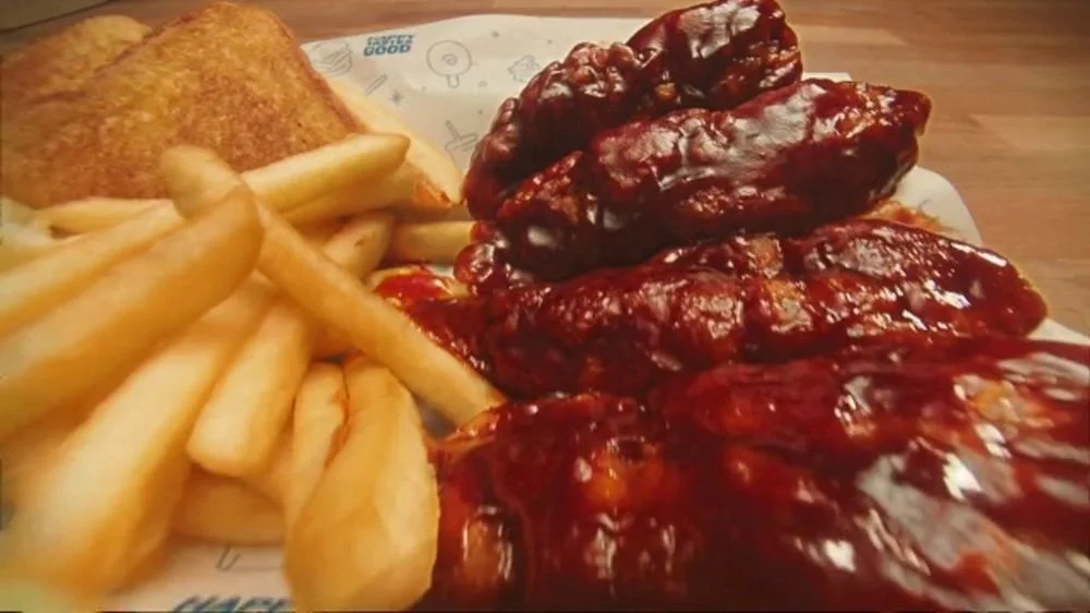 Dairy Queen TV Spot, 'Sauced and Tossed Chicken Strip Baskets: Layered With Flavor'