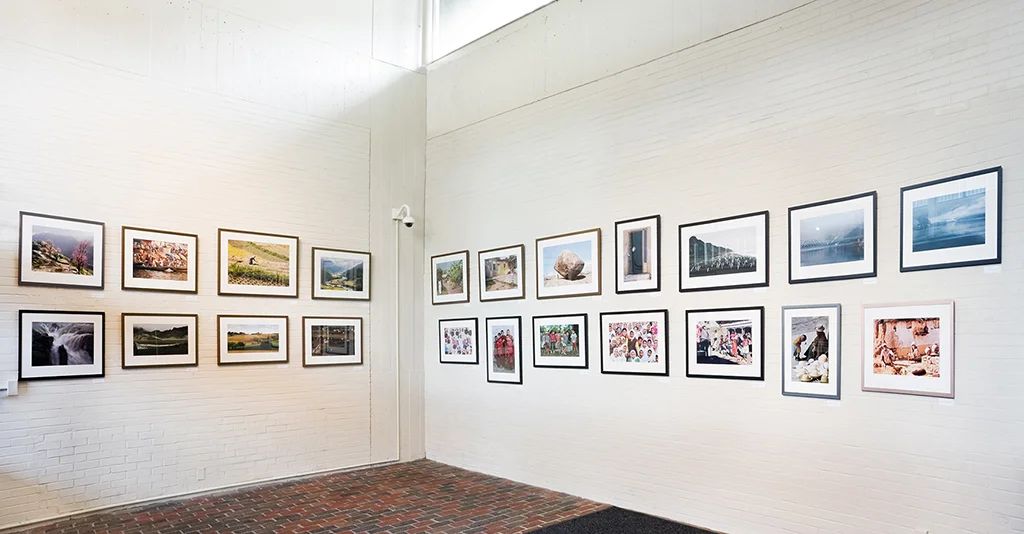 Public and private settings in which photographs have been or are being shown, including temporary exhibits and permanent installations.