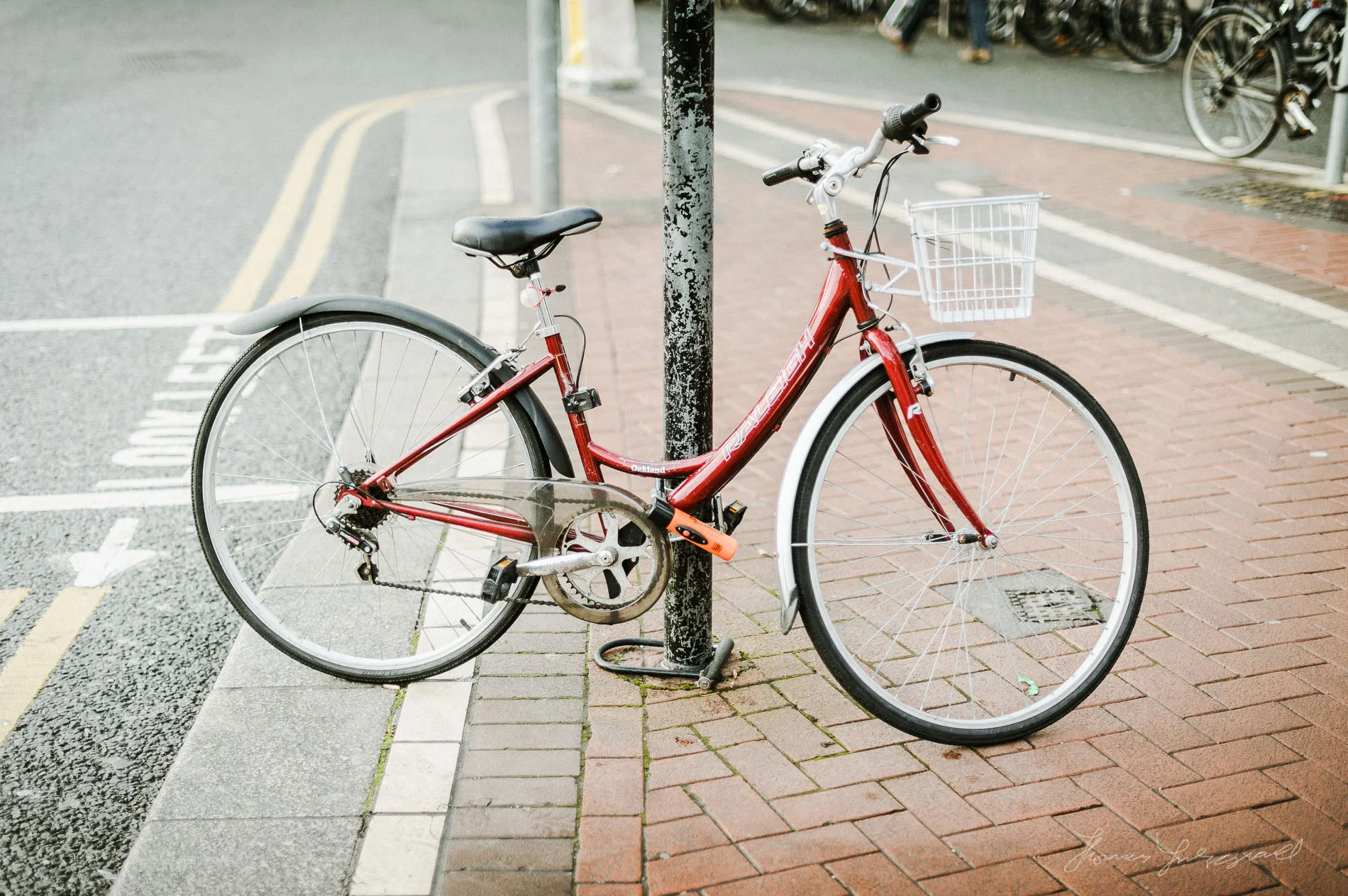 Photograph of Bright Red Bicycle