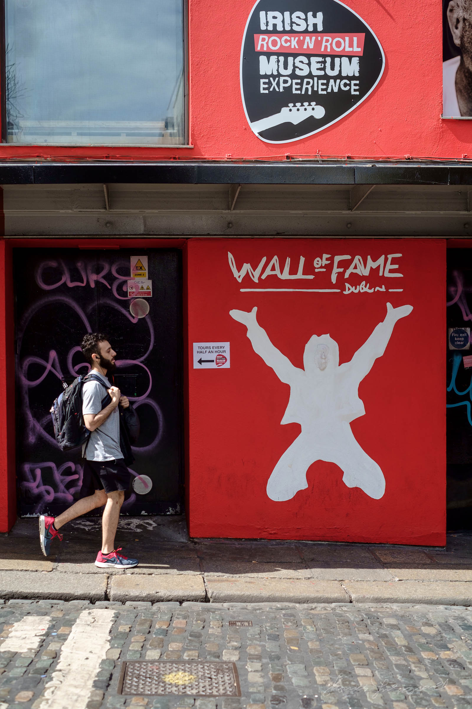 Walking by the Wall of Fame in Dublin's Temple Bar