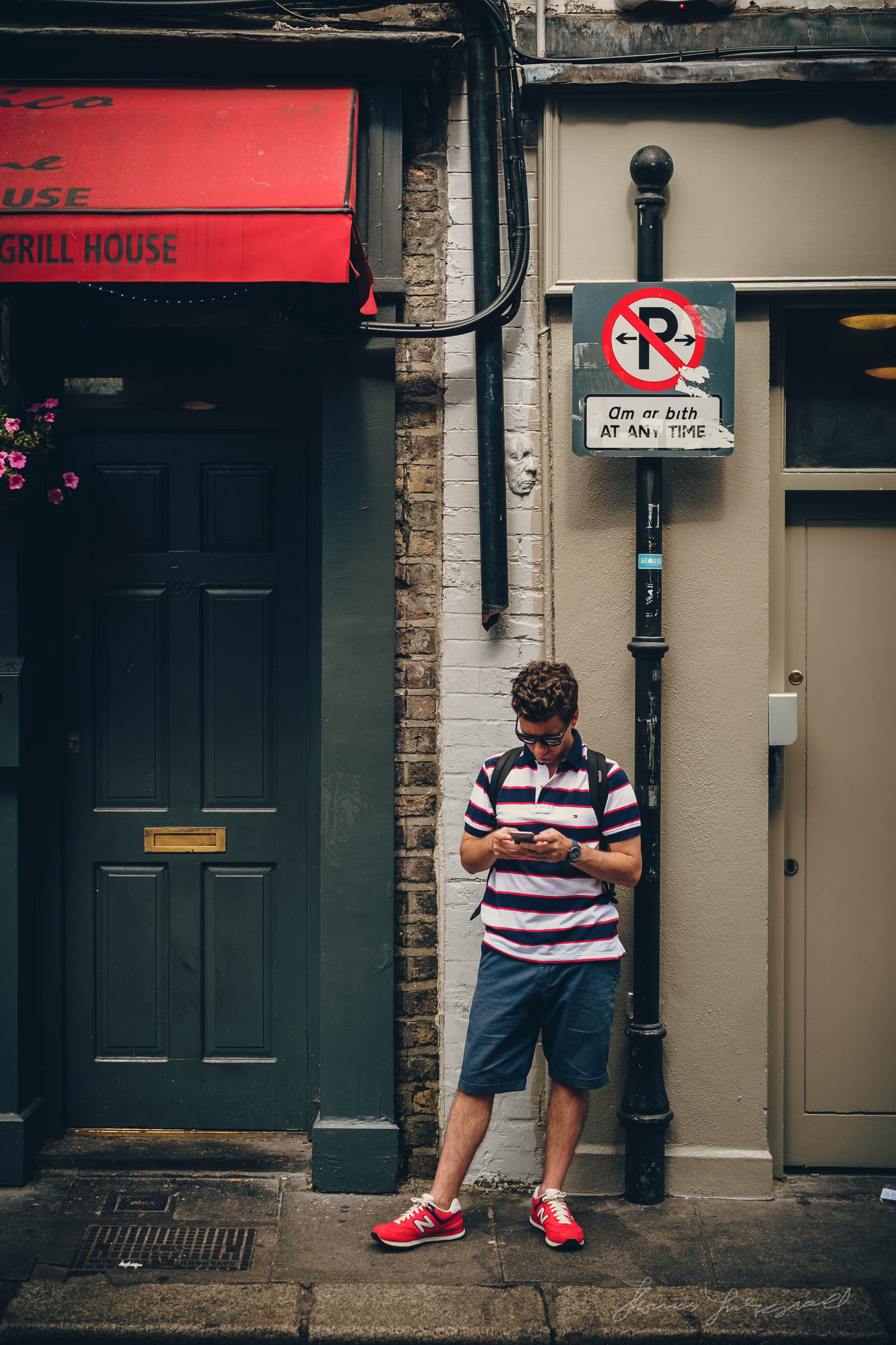 Guy on his Smart Phone in Dublin