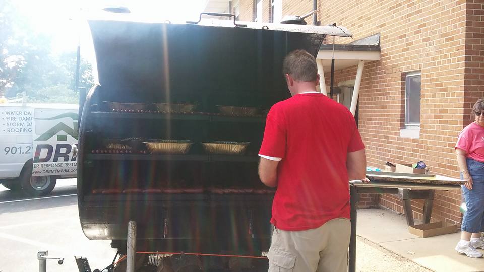 The Collierville cooks brought their home made grill-trailer on the road and even supplied hot dog buns for communion at worship!