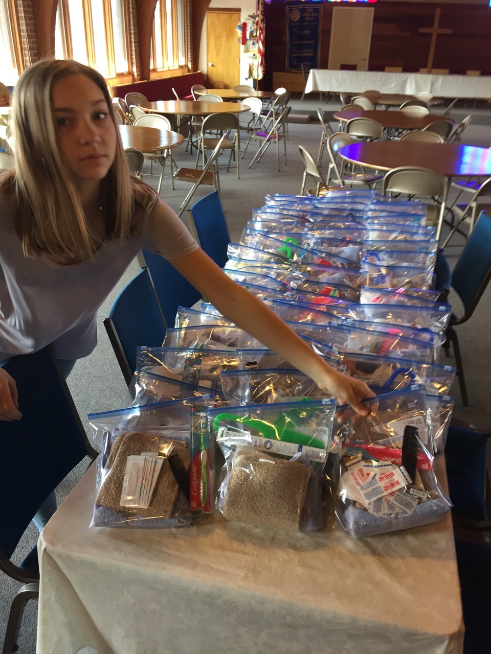 girl with table of kits.jpeg