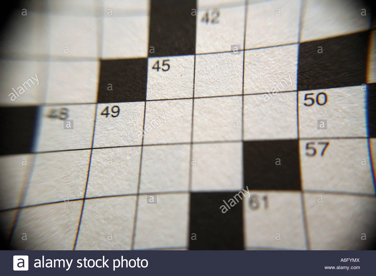 macro-shot-of-a-blank-crossword-puzzle-with-vignetted-edges-A6FYMX.jpg