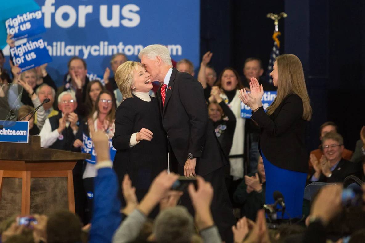 Former Secretary of State Hillary Clinton greets her husband former President Bill Clinton and daughter Chelsea Clinton after giving a a speech in Manchester, New Hampshire.