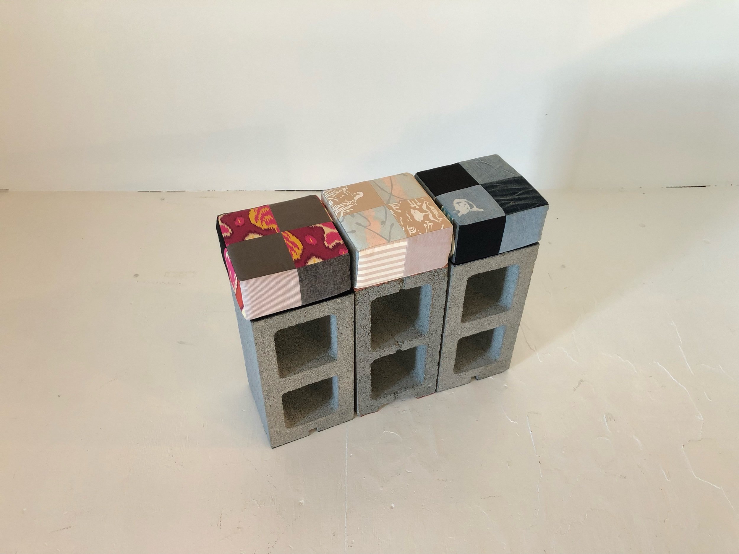 Breeze Block Stools, 2019 20 x 8 x 8 inches each Concrete blocks, ink, fabric and leather