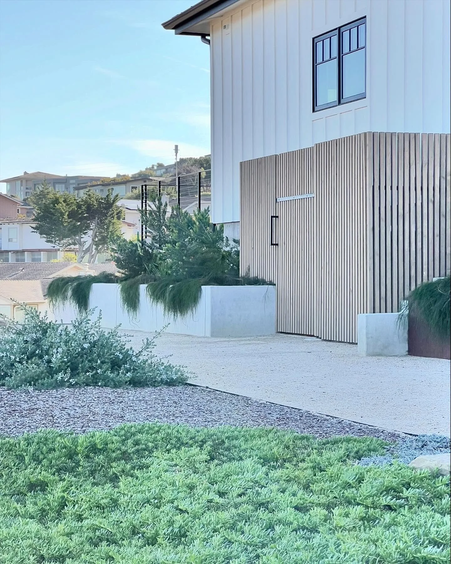 This hilltop design was all about depth and detail. Our goal was to soften the perimeter around the homes footprint and ease the transition to the open space around it. Thoughtful choices created purposeful layers and the opportunity to blur the line