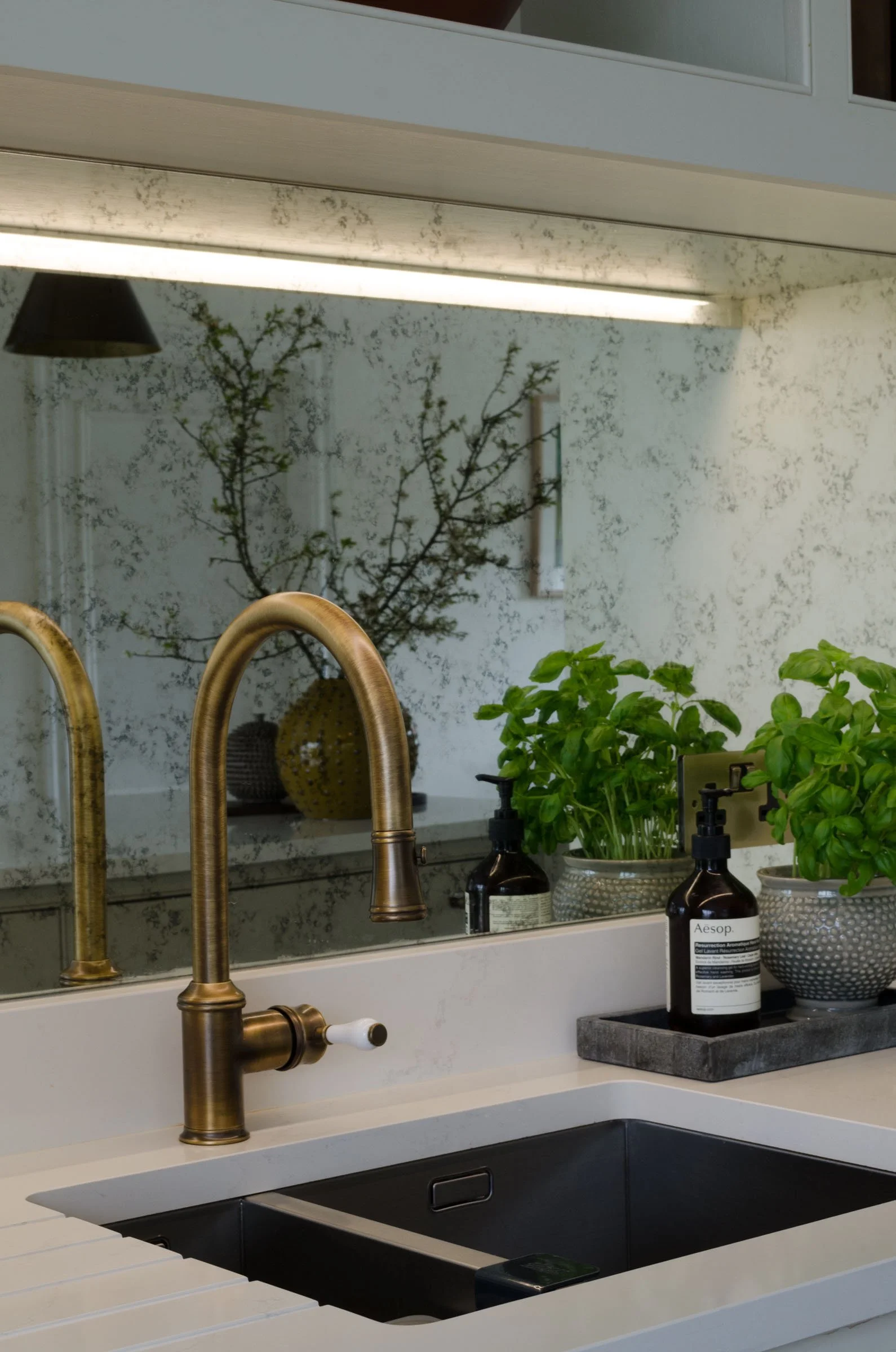 brass-tap-antique-mirror-backsplash.jpg