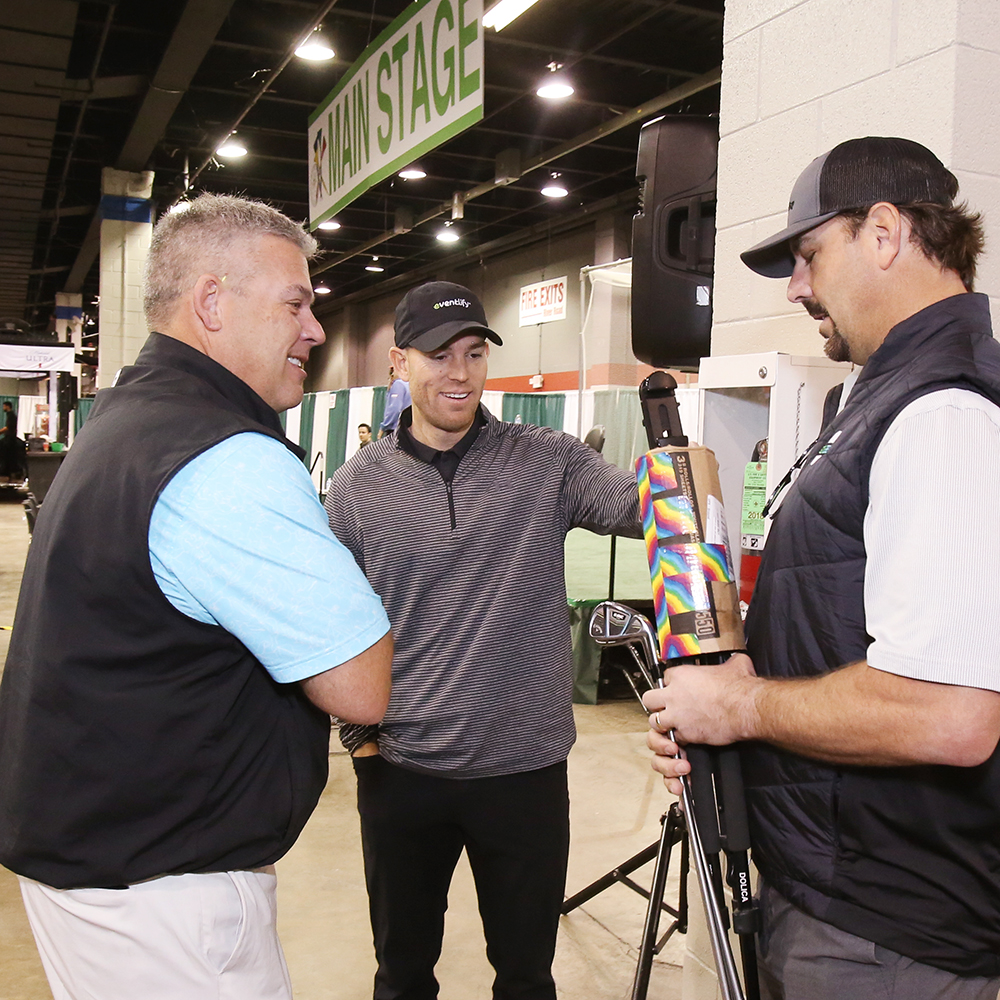A Meeting of two Former Bears: Robbie Gould (center) has some questions for Patrick Mannelly (right)
