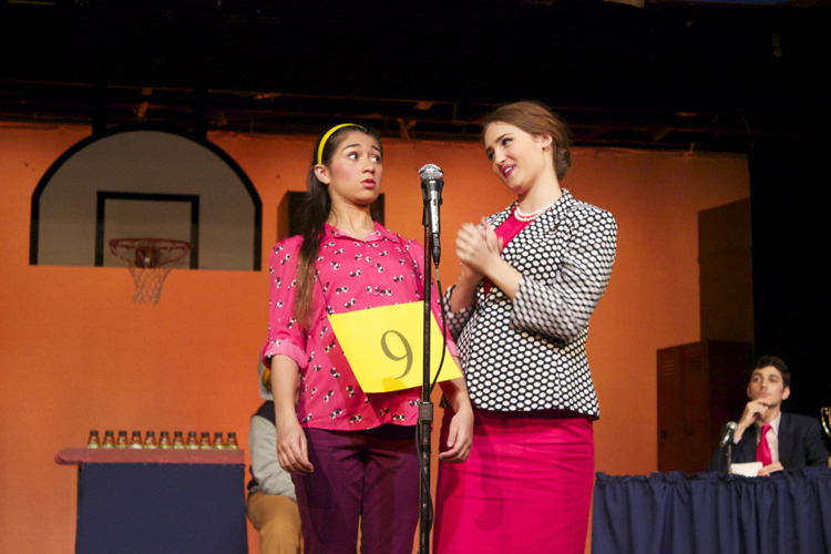  Perretti shows Ostrovsky how a spelling bee champion is supposed to stand. And she should know, Perretti won the 3rd annual Putnam County bee. 