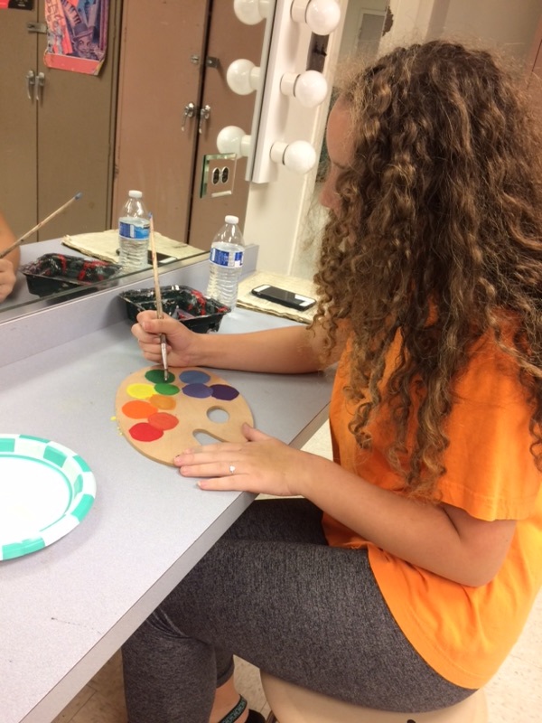 ASSt. Props Chairman Reyna Katko decides what colors to make new props