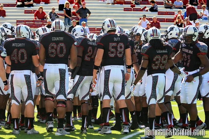 STAFF PHOTO BY PAUL COLLINS: These "Wounded Warrior" jerseys were only worn during pre-game warm-ups. 