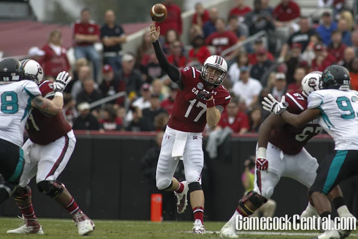 Staff photo by Chris Gillespie. Dylan Thompson airs it out against Coastal Carolina.