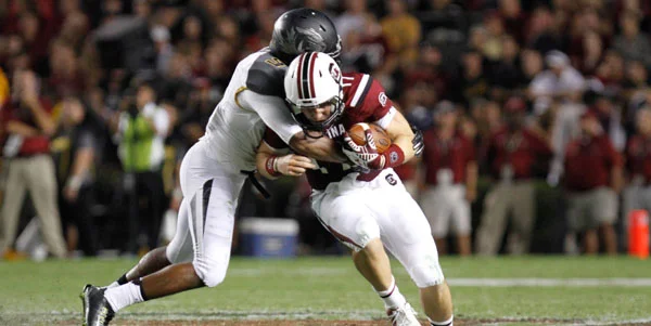 Dylan Thompson was under duress all night against Mizzou. Staff Photo by CJ Driggers