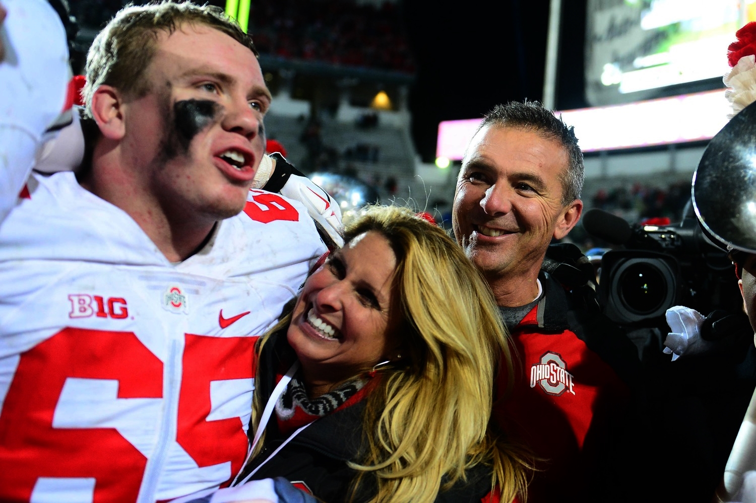 Shelly Meyer really loves hanging out with these young, muscle-bound college athletes. After 28 years of being married to Urban, I think we'd all get desperate.
